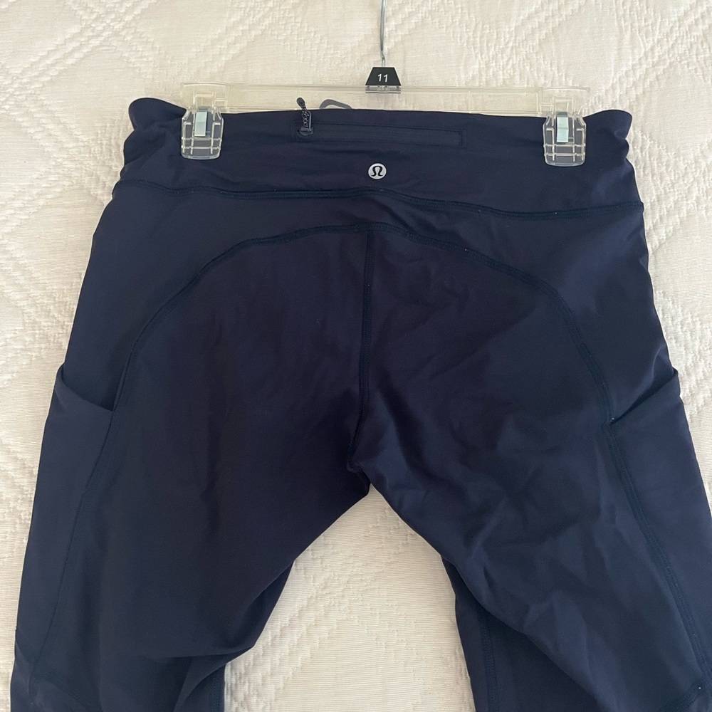 Full length navy blue Lululemon leggings w/ pockets - Picture 2 of 7